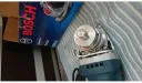 Сетевая угловая шлифмашина (болгарка) Bosch GWX 9-125 S, 900Вт, 125мм, X-LOCK, картон (06017B2000), синий/черный