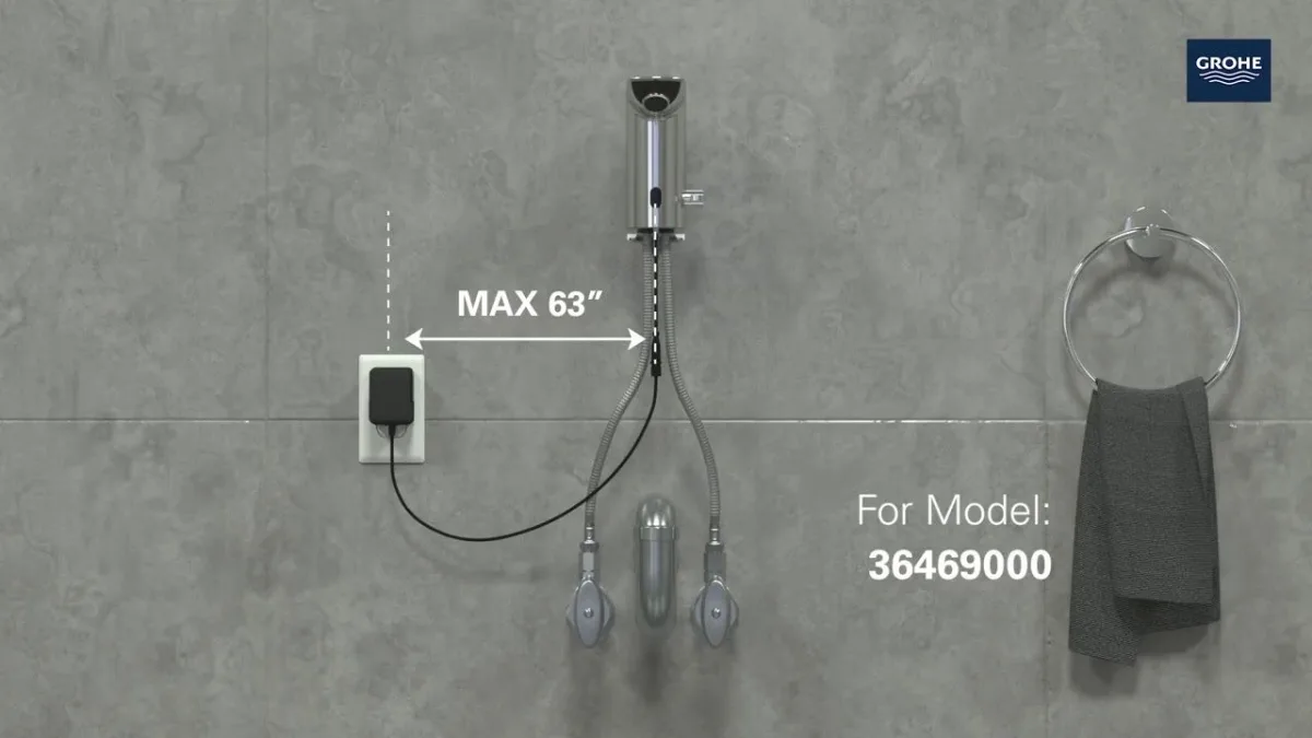 Смеситель для раковины cенсорный Grohe Bau Cosmopolitan E 36453 000 (36453000) хром — фото 9 из 10